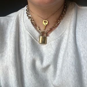 Authentic Louis Vuitton #313 lock and key set on necklace